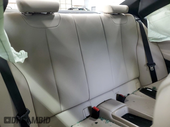 2018 BMW 2 Series 230i xDrive z VIN WBA2J3C5XJVD48455, wystawiony jako Copart lot #58833125 z przebiegiem Nie podano mil oraz Szkoda całkowita • Salvage title. Historia ofert i sprzedaży dostępna na DreamBid. Obrazek 10.