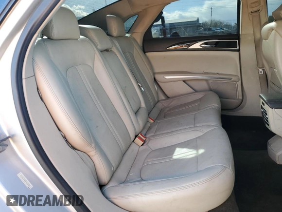 2016 Lincoln MKZ z VIN 3LN6L2GK2GR623601, wystawiony jako Copart lot #43823305 z przebiegiem 106 360 mil mil oraz Szkoda całkowita • Salvage title. Historia ofert i sprzedaży dostępna na DreamBid. Obrazek 10.