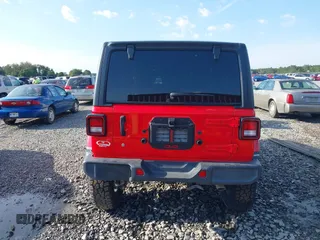 2020 Jeep Wrangler Unlimited Sahara High Altitude with VIN 1C4HJXEG2LW182641, listed as a IAAI auction lot 40130890 with 79,984 mi miles and . Bid and sale history available at DreamBid. Image 16.