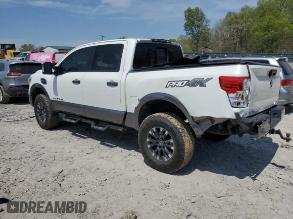 2017 Nissan Titan SV with VIN 1N6AA1E53HN570453, listed as a Copart auction lot 52941025 with 146,705 mi miles and Salvage title. Bid and sale history available at DreamBid. Image 2.