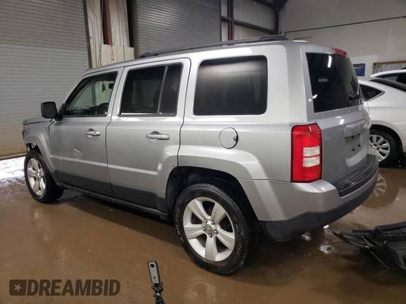 2014 Jeep Patriot Latitude with VIN 1C4NJPFB1ED767103, listed as a Copart auction lot 51844535 with 158,480 mi miles and Salvage title. Bid and sale history available at DreamBid. Image 2.