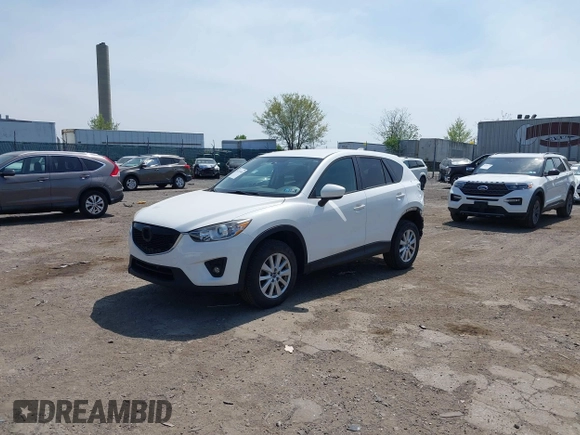 2013 Mazda CX-5 Touring with VIN JM3KE4CE1D0136241, listed as a IAAI auction lot 42119260 with 106,913 mi miles and . Bid and sale history available at carsss.com. Image 17.