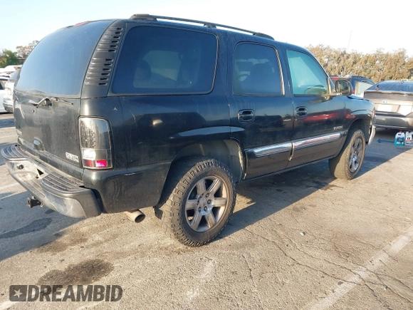 2005 GMC Yukon SLE with VIN 1GKEC13V15R105390, listed as a IAAI auction lot 42076410 with 237,160 mi miles. Bid and sale history available at carsss.com. Image 4.