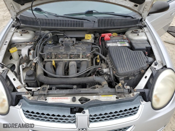 2004 Dodge Neon SXT with VIN 1B3ES56C54D628554, listed as a Copart auction lot 73219764 with 67,373 mi miles and Salvage Title. Bid and sale history available at carsss.com. Image 12.