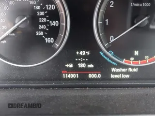 2013 BMW 5 Series 528i xDrive with VIN WBAXH5C59DDW15444, listed as a IAAI auction lot 40818314 with 114,901 mi miles and . Bid and sale history available at DreamBid. Image 7.