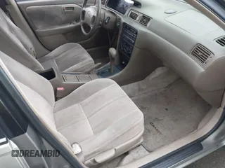 1998 Toyota Camry LE z VIN JT2BG22K7W0225872, wystawiony jako IAAI lot #41252434 z przebiegiem 160 763 mil mil oraz . Historia ofert i sprzedaży dostępna na DreamBid. Obrazek 5.