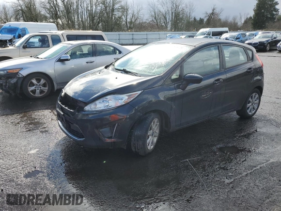 2012 Ford Fiesta SE z VIN 3FADP4EJ4CM183237, wystawiony jako Copart lot #48825605 z przebiegiem 92 798 mil mil oraz Szkoda całkowita • Salvage title. Historia ofert i sprzedaży dostępna na DreamBid. Obrazek 1.