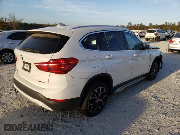 2020 BMW X1 xDrive28i with VIN WBXJG9C02L3L57542, listed as a Copart auction lot 67003112 with 18,619 mi miles. Bid and sale history available at carsss.com. Image 4.