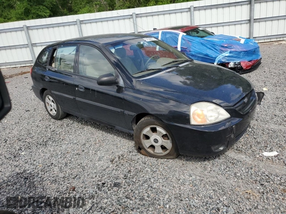 2003 Kia Rio with VIN KNADC165036169340, listed as a Copart auction lot 51538975 with 136,054 mi miles and Salvage Title. Bid and sale history available at carsss.com. Image 4.