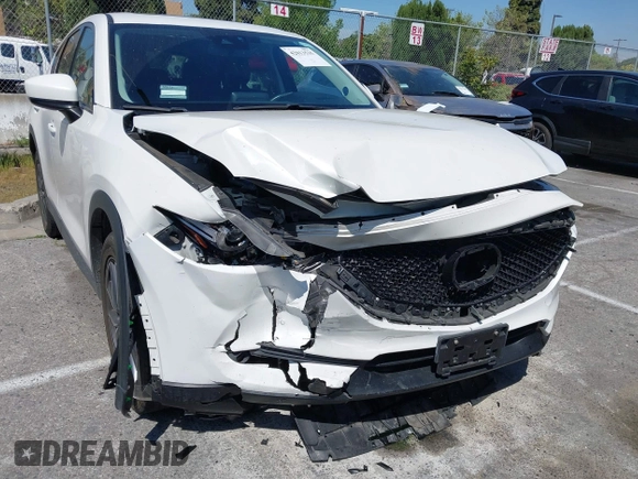 2018 Mazda CX-5 Grand Touring with VIN JM3KFADM8J0373368, listed as a IAAI auction lot 42013535 with 63,142 mi miles and . Bid and sale history available at DreamBid. Image 6.
