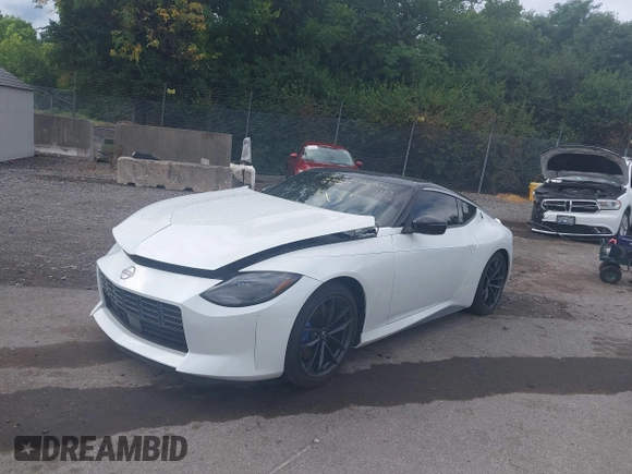 2023 Nissan Z Proto Spec with VIN JN1BZ4BH4PM311977, listed as a IAAI auction lot 42352895 with 1,020 mi miles and . Bid and sale history available at DreamBid. Image 2.