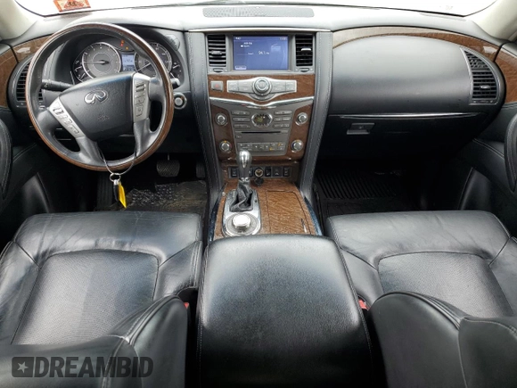 2016 Infiniti QX80 with VIN JN8AZ2NCXG9401865, listed as a Copart auction lot 70574004 with 111,335 mi miles and Salvage Title. Bid and sale history available at DreamBid. Image 8.