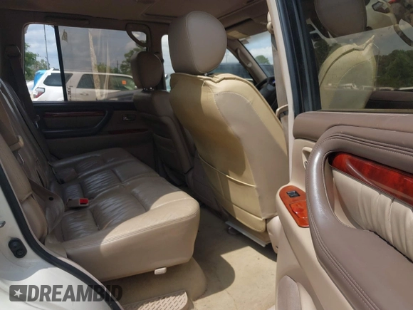 1999 Lexus LX 470 with VIN JT6HT00W5X0065846, listed as a IAAI auction lot 42142816 with 288,854 mi miles and . Bid and sale history available at DreamBid. Image 8.