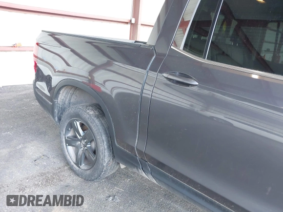 2023 Honda Ridgeline RTL с VIN 5FPYK3F52PB046921, выставлен на аукционе IAAI как лот 42389336 с пробегом 20 858 миль миль и . История ставок и продаж доступна на DreamBid. Изображение 6.