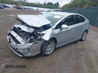 2015 Toyota Prius Four z VIN JTDKN3DU0F0455819, wystawiony jako IAAI lot #42169941 z przebiegiem 63 861 mil mil oraz . Historia ofert i sprzedaży dostępna na DreamBid. Obrazek 2.
