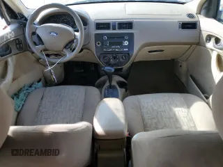 2005 Ford Focus S with VIN 1FAFP34N35W141023, listed as a Copart auction lot 84230574 with 244,545 mi miles and Salvage Title. Bid and sale history available at carsss.com. Image 8.
