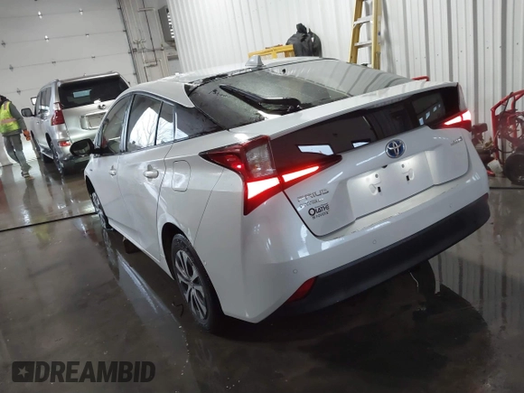 2021 Toyota Prius LE with VIN JTDL9MFU9M3025214, listed as a IAAI auction lot 41375860 with 76,259 mi miles and . Bid and sale history available at DreamBid. Image 3.