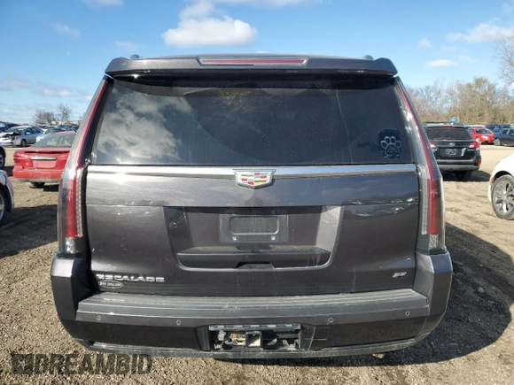 2015 Cadillac Escalade Platinum z VIN 1GYS4PKJ9FR643540, wystawiony jako Copart lot #80931014 z przebiegiem 156 820 mil mil oraz Szkoda całkowita • Salvage title. Historia ofert i sprzedaży dostępna na DreamBid. Obrazek 6.