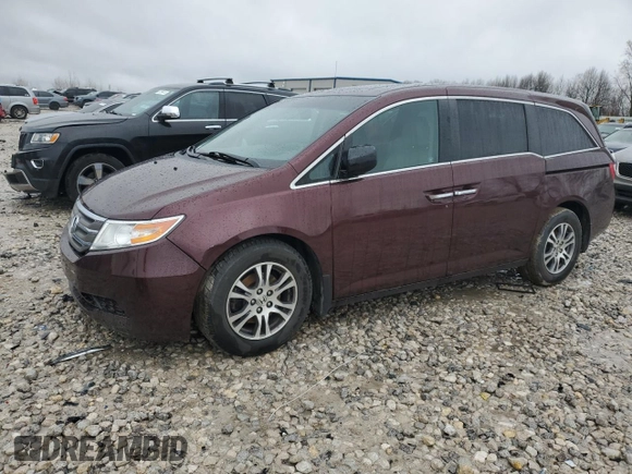 2012 Honda Odyssey EX-L with VIN 5FNRL5H61CB019702, listed as a Copart auction lot 51535585 with 185,737 mi miles and Clean Title. Bid and sale history available at DreamBid. Image 1.