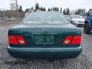 1998 Mercedes-Benz E-Class with VIN WDBJF65FXWA589630, listed as a IAAI auction lot 41990725 with 102,149 mi miles. Bid and sale history available at carsss.com. Image 16.