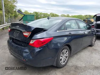 2013 Hyundai Sonata GLS with VIN 5NPEB4AC0DH606973, listed as a IAAI auction lot 42027694 with 243,935 mi miles and . Bid and sale history available at carsss.com. Image 4.
