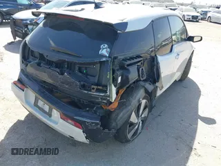 2015 BMW i3 z VIN WBY1Z2C51FV286397, wystawiony jako IAAI lot #41729019 z przebiegiem Nie podano mil oraz . Historia ofert i sprzedaży dostępna na DreamBid. Obrazek 4.