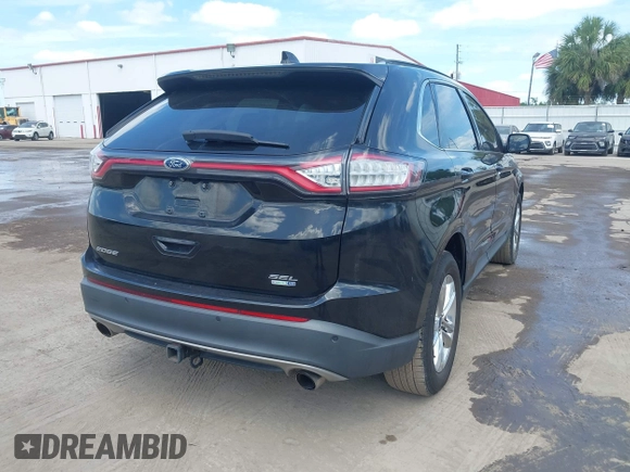 2015 Ford Edge SEL with VIN 2FMTK4J90FBB02669, listed as a IAAI auction lot 42176184 with 213,465 mi miles. Bid and sale history available at carsss.com. Image 4.