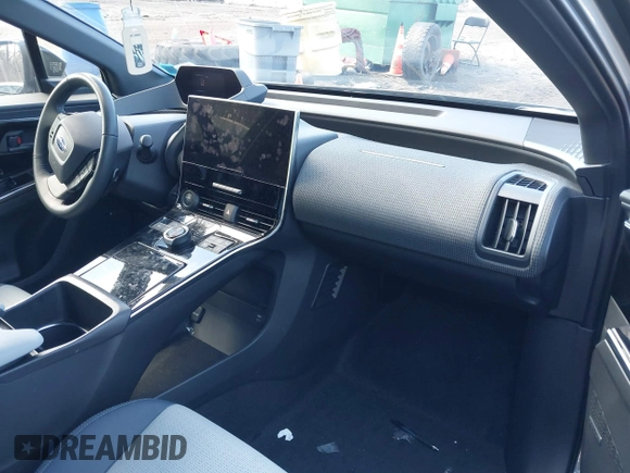2023 Subaru Solterra Touring with VIN JTMABABA9PA038499, listed as a IAAI auction lot 41824052 with 16,176 mi miles and . Bid and sale history available at DreamBid. Image 5.