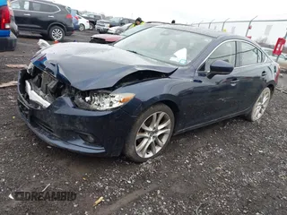 2017 Mazda Mazda6 Touring with VIN JM1GL1V59H1154440, listed as a IAAI auction lot 41078595 with 104,732 mi miles. Bid and sale history available at carsss.com. Image 18.