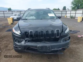 2016 Jeep Cherokee Trailhawk with VIN 1C4PJMBS4GW169267, listed as a IAAI auction lot 42597291 with 79,258 mi miles and . Bid and sale history available at DreamBid. Image 12.