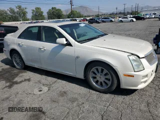 2006 Cadillac STS z VIN 1G6DW677560132284, wystawiony jako Copart lot #55707415 z przebiegiem 329 037 mil mil oraz Czysty tytuł • Clean title. Historia ofert i sprzedaży dostępna na DreamBid. Obrazek 4.