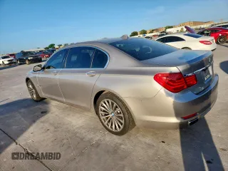 2012 BMW 7 Series 740Li with VIN WBAKB4C59CC576610, listed as a Copart auction lot 62762465 with 128,073 mi miles and Clean title. Bid and sale history available at DreamBid. Image 2.