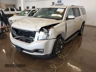 2015 GMC Yukon XL Denali with VIN 1GKS2JKJXFR528927, listed as a IAAI auction lot 41391259 with 159,467 mi miles. Bid and sale history available at carsss.com. Image 19.
