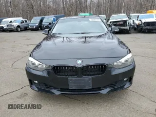 2013 BMW 3 Series 328i xDrive with VIN WBA3B3C51DJ976382, listed as a Copart auction lot 52262085 with 110,432 mi miles and Salvage title. Bid and sale history available at DreamBid. Image 5.