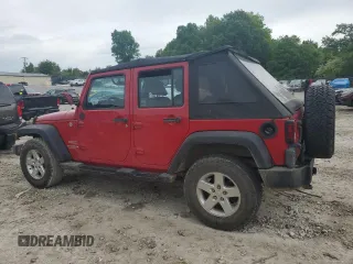 2012 Jeep Wrangler Unlimited Sport z VIN 1C4BJWDG0CL272440, wystawiony jako Copart lot #56044005 z przebiegiem 143 117 mil mil oraz Szkoda całkowita • Salvage title. Historia ofert i sprzedaży dostępna na DreamBid. Obrazek 2.
