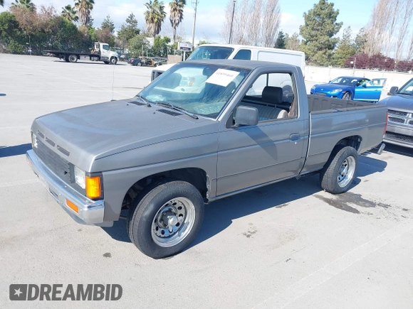 1988 Nissan Hardbody z VIN 1N6ND11S0JC345025, wystawiony jako IAAI lot #41899460 z przebiegiem 132 502 mil mil oraz . Historia ofert i sprzedaży dostępna na DreamBid. Obrazek 2.