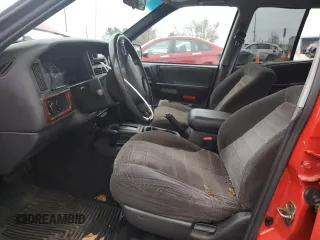 1998 Jeep Grand Cherokee Laredo with VIN 1J4GZ58S6WC104114, listed as a Copart auction lot 84232604 with 0 mi miles and Salvage Title. Bid and sale history available at carsss.com. Image 7.