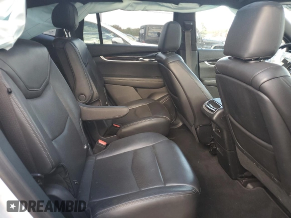 2020 Cadillac XT6 FWD Premium Luxury with VIN 1GYKPCRS2LZ138465, listed as a Copart auction lot 76114034 with 57,353 mi miles and Salvage Title. Bid and sale history available at carsss.com. Image 11.