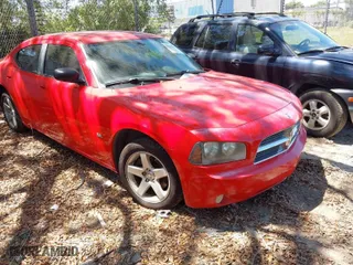2009 Dodge Charger SXT with VIN 2B3KA33V49H556093, listed as a IAAI auction lot 42048956 with 164,284 mi miles. Bid and sale history available at carsss.com. Image 1.