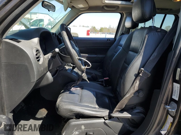2014 Jeep Patriot High Altitude with VIN 1C4NJPFAXED758133, listed as a Copart auction lot 48975185 with 193,633 mi miles and Salvage Title. Bid and sale history available at carsss.com. Image 7.