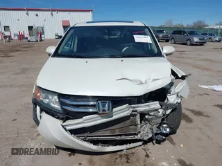 2016 Honda Odyssey EX-L z VIN 5FNRL5H65GB055317, wystawiony jako IAAI lot #41825497 z przebiegiem 117 672 mil mil oraz . Historia ofert i sprzedaży dostępna na DreamBid. Obrazek 13.