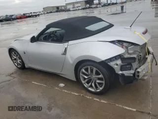 2012 Nissan 370Z Touring z VIN JN1AZ4FH5CM371038, wystawiony jako Copart lot #50289285 z przebiegiem 52 508 mil mil oraz Szkody całkowita. Historia ofert i sprzedaży dostępna na DreamBid. Obrazek 2.