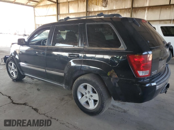 2006 Jeep Grand Cherokee Limited with VIN 1J4HR58286C307106, listed as a Copart auction lot 59401125 with 153,219 mi miles and Salvage title. Bid and sale history available at DreamBid. Image 2.
