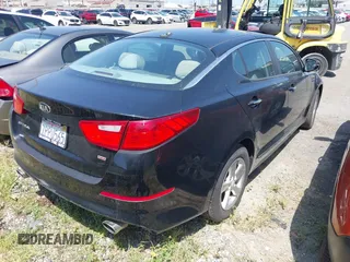 2015 Kia Optima LX with VIN 5XXGM4A79FG517083, listed as a IAAI auction lot 41805370 with 77,800 mi miles. Bid and sale history available at carsss.com. Image 4.