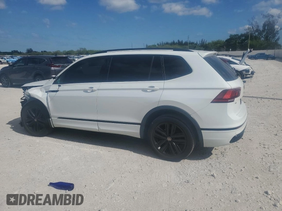 2022 Volkswagen Tiguan SE R-Line Black with VIN 3VVCB7AX8NM009403, listed as a Copart auction lot 52720885 with 74,063 mi miles and Salvage title. Bid and sale history available at DreamBid. Image 2.
