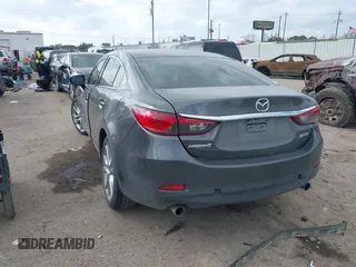2017 Mazda 6 Touring with VIN JM1GL1V57H1127804, listed as a IAAI auction lot 41515342 with 107,336 mi miles and . Bid and sale history available at carsss.com. Image 3.