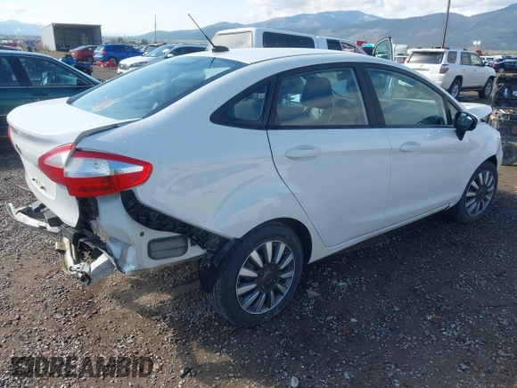 2018 Ford Fiesta S z VIN 3FADP4AJ2JM136775, wystawiony jako IAAI lot #42136725 z przebiegiem 47 072 mil mil oraz . Historia ofert i sprzedaży dostępna na DreamBid. Obrazek 4.