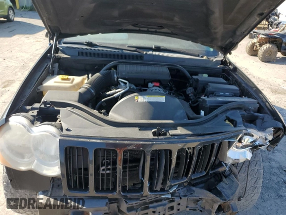 2008 Jeep Grand Cherokee Laredo with VIN 1J8GR48KX8C102393, listed as a Copart auction lot 69696834 with 173,049 mi miles and Salvage Title. Bid and sale history available at carsss.com. Image 13.