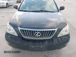 2008 Lexus RX with VIN 2T2HK31U38C064322, listed as a IAAI auction lot 42074366 with 241,459 mi miles. Bid and sale history available at carsss.com. Image 12.