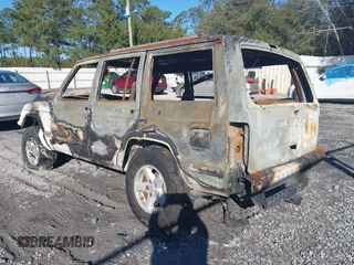 2001 Jeep Cherokee Sport with VIN 1J4FT48S31L574469, listed as a IAAI auction lot 41346497 with 1 mi miles. Bid and sale history available at carsss.com. Image 3.